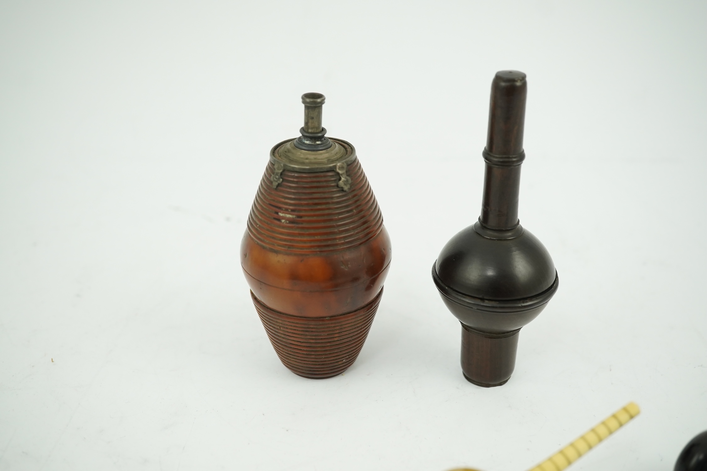 A 19th century coquilla nut powder flask, a hardwood cased ivorine hydrometer and a small ebony gavel, gavel 11cm long. Condition - good